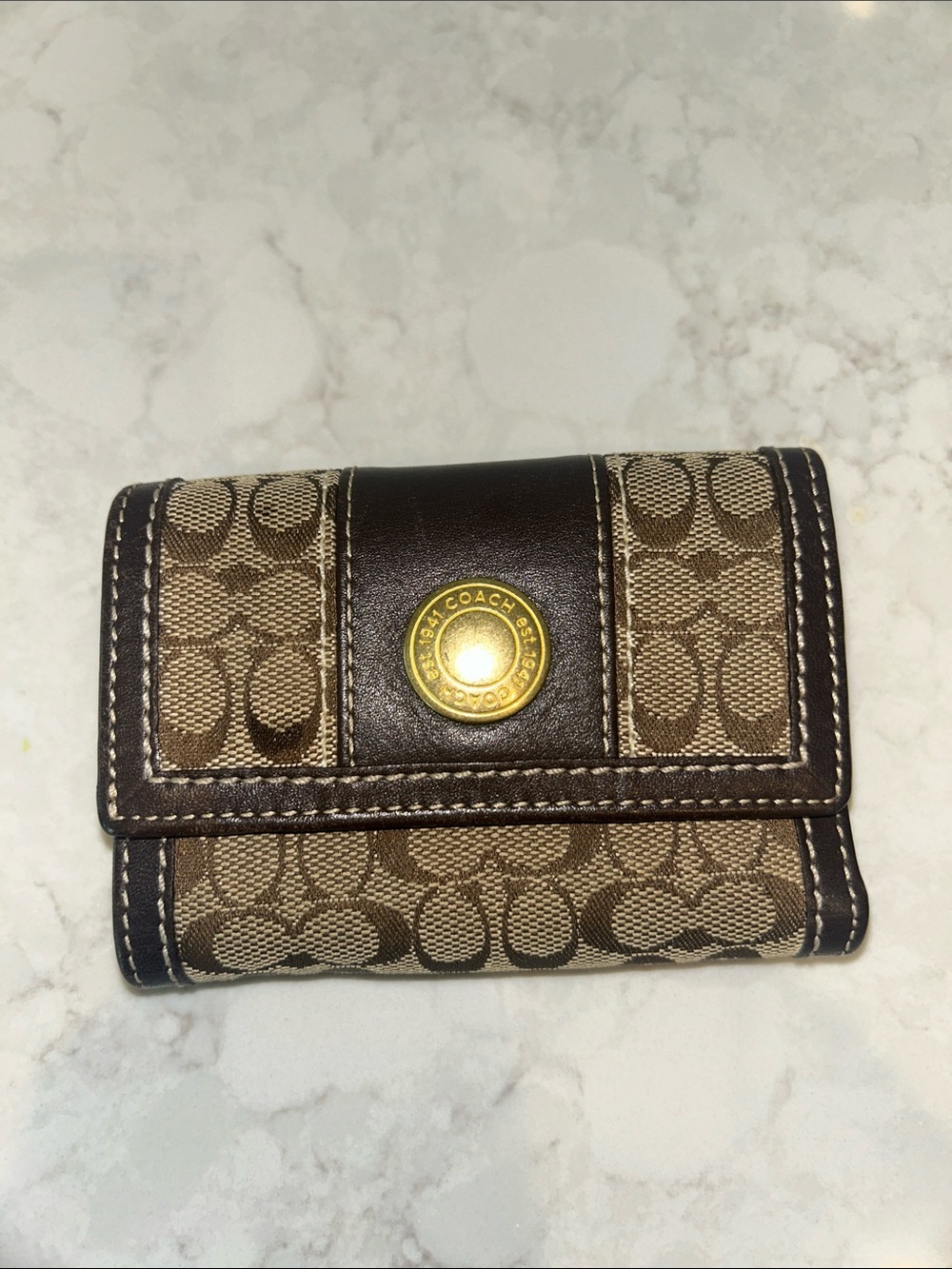 vintage Coach brown signature "C" canvas and dark brown leather snap wallet